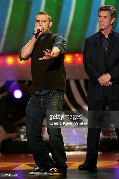 Singer Justin Timberlake and Actor Tom Bergeron compete in a Burp Off Contest onstage at the 19th Annual Kid's Choice Awards held at UCLA's Pauley...