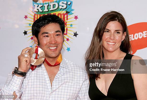 Bronze medalist in freestyle moguls Toby Dawson and guest Lea arrive at the 19th Annual Kid's Choice Awards held at UCLA's Pauley Pavilion on April...