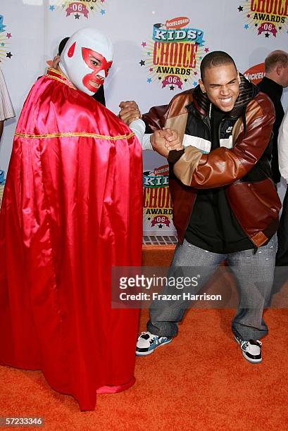 Singer Chris Brown and guest arrive at the 19th Annual Kid's Choice Awards held at UCLA's Pauley Pavilion on April 1, 2006 in Westwood, California.