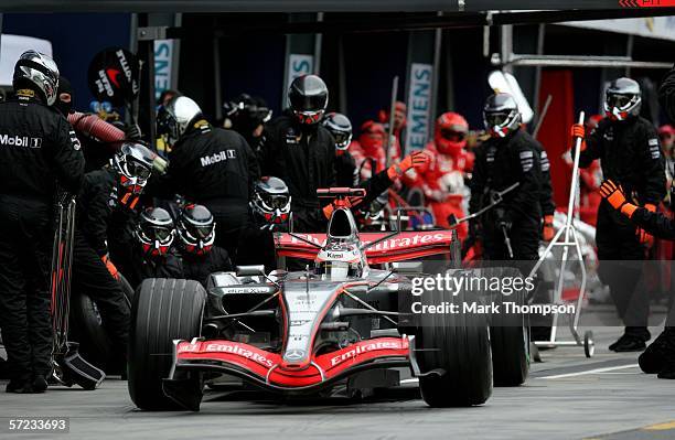 Kimi Raikkonen of Finland drives his McLaren-Mercedes after a pit stop during the Australian Formula One Grand Prix at the Albert Park Circuit on...