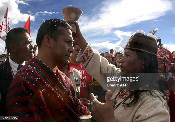 Peruvian presidential candidate, former Lieutenant Colonel Ollanta Humala of the Union for Peru party , is blessed by a shaman in an Andean ceremony...