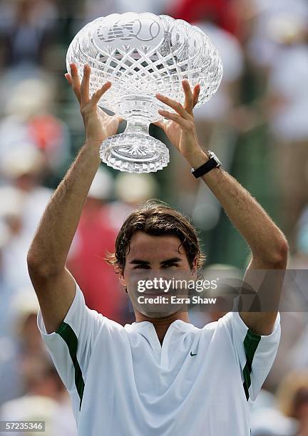 Roger Federer of Switzerland holds up his trophy after winning the men's final by defeating Ivan Ljubicic of Croatia during the Nasdaq-100 Open at...