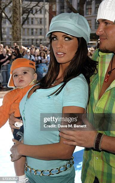 Model Jordan and husband singer Peter Andre with their son Junior arrive at the UK Premiere of 'Ice Age 2: The Meltdown' at the Empire Leicester...