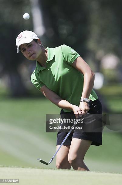Lorena Ochoa of Mexico hits a pitch shot to the seventh green during the final round of the Kraft Nabisco Championship at the Mission Hills Country...