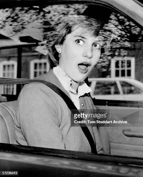 Lady Diana Spencer is startled after stalling her new red Mini Metro outside her Earls Court flat in London just days before her engagement to Prince...