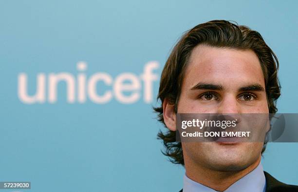 New York, UNITED STATES: Tennis star Roger Federer of Switzerland talks to those gathered to see him join UNICEF as a Goodwill Ambassador 3 April,...