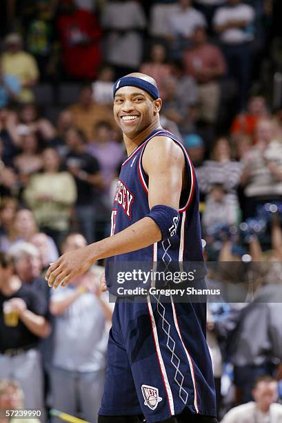 Vince Carter of the New Jersey Nets smiles during the game against the New Orleans/Oklahoma City Hornets at the Ford Center on March 12, 2006 in...