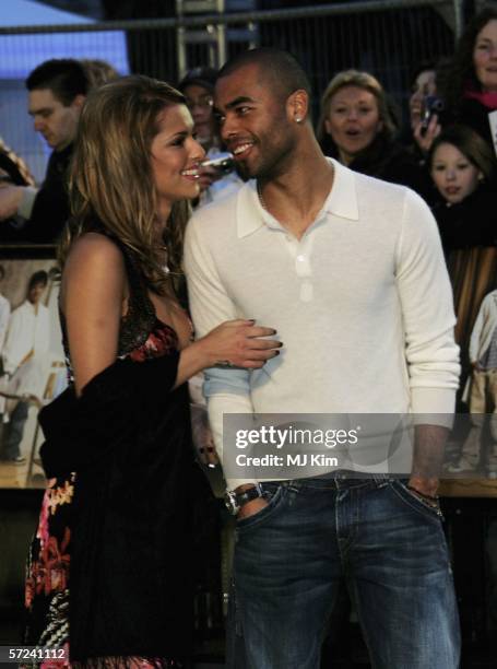 Soccer star Arsenal and England defender Ashley Cole and girlfriend singer Cheryl Tweedy from the band Girls Aloud arrive at the World Premiere of...