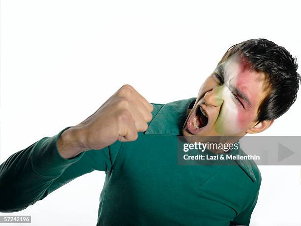 football fan with mexican flag painted on face - shape color identity series bildbanksfoton och bilder