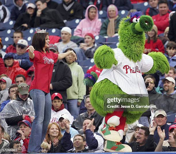 Jennifer Berry, Miss America 2006, dances with the Philly Phanatic during the game of the Philadelphia Phillies against the St. Louis Cardinals...