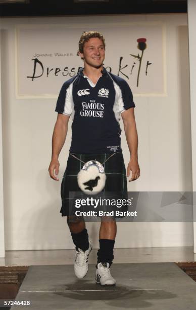 Chris Cuiscier walks the runway at the Johnnie Walker Dressed to Kilt fashion show at St John Divine Cathedral on April 3, 2006 in New York City.