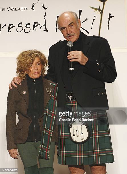 Actor Sean Connery and wife Micheline speak on the runway at the Johnnie Walker Dressed to Kilt fashion show at St John Divine Cathedral on April 3,...
