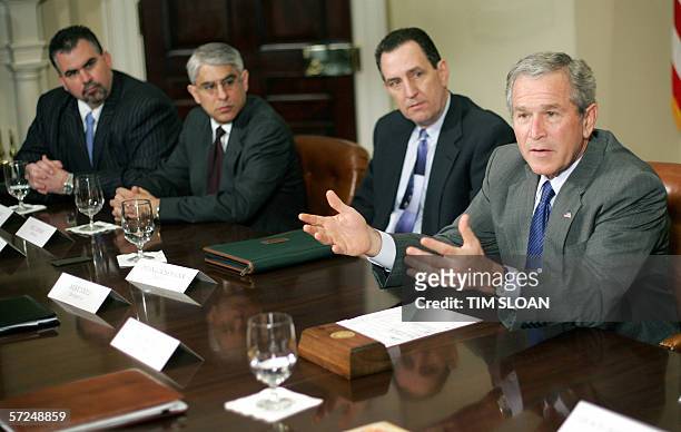 Washington, UNITED STATES: US President George W. Bush meets with representitives from insurance companies, banks and businesses that offer their...