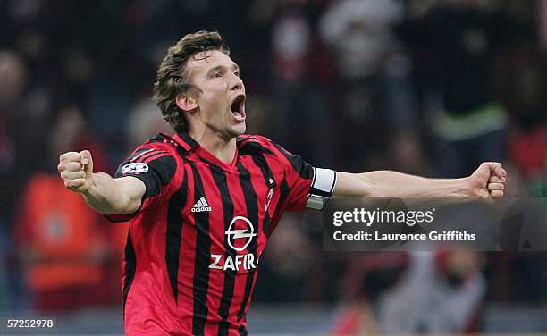 Andriy Shevchenko of AC Milan celebrates victory at the end of the UEFA Champions League Quarter Final Second Leg match between AC Milan and Lyon at...