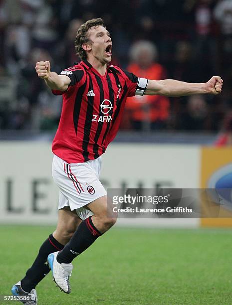 Andriy Shevchenko of AC Milan celebrates victory at the end of the UEFA Champions League Quarter Final Second Leg match between AC Milan and Lyon at...