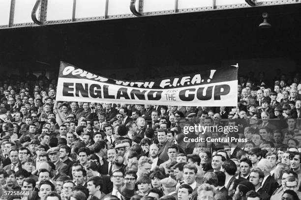 Banner in the Goodison Park crowd during the 1966 World Cup semi final between West Germany and Russia, 25th July 1966. The fans are protesting...