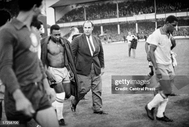 Dejected Pele leaves the field after the Group C match between Brazil and Portugal at Goodison Park during the 1966 World Cup in England, 19th July...