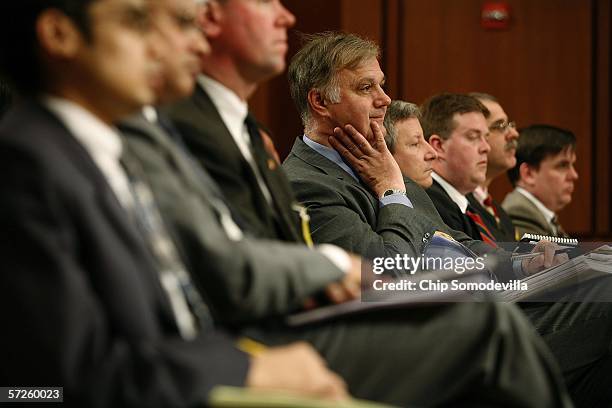 State Department officials and other observers listen to United States Secretary of State Condoleezza Rice testify during a full committee hearing of...