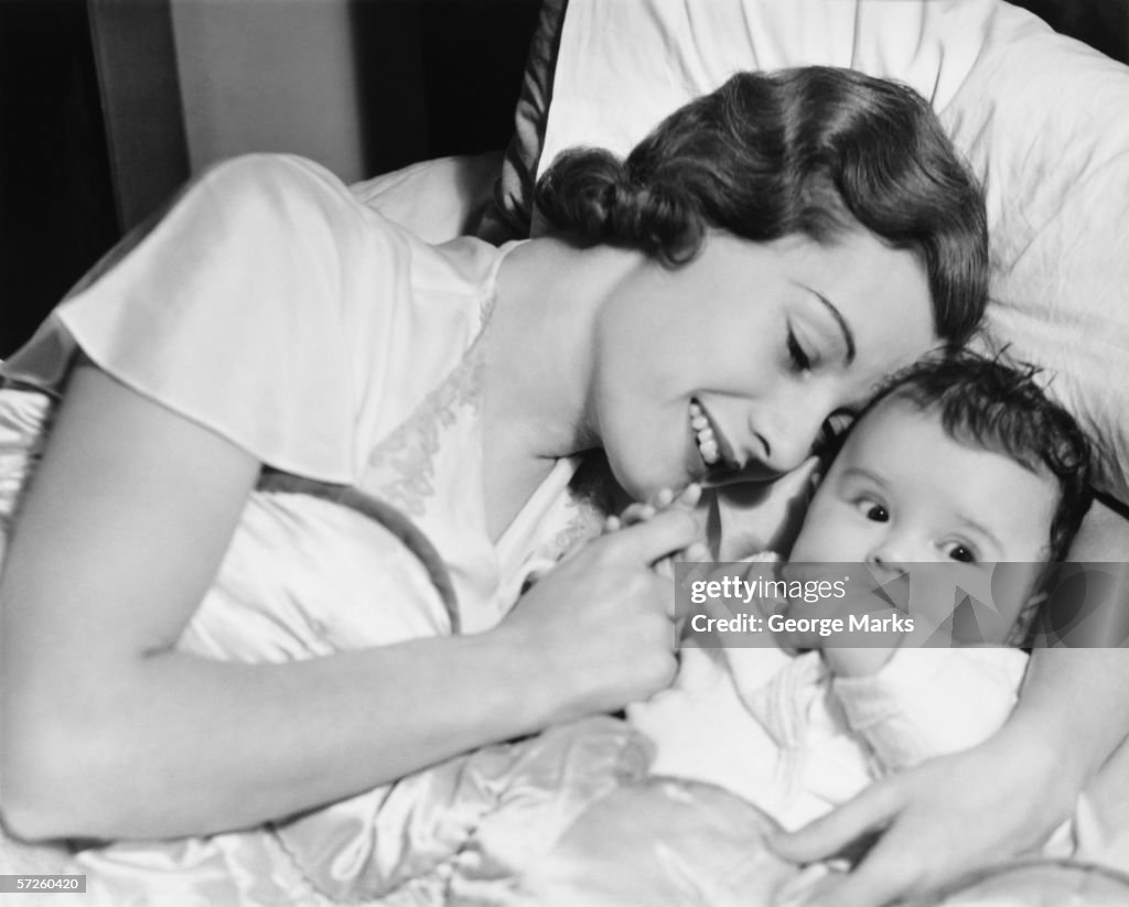 Mother Cuddling Baby Boy Closeup High Res Stock Photo Getty Images mother-cuddling-baby-boy-closeup-high-res-stock-photo-getty-images
