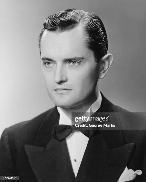 elegant man posing in studio, (b&w), close-up, portrait - white tuxedo stock pictures, royalty-free photos & images