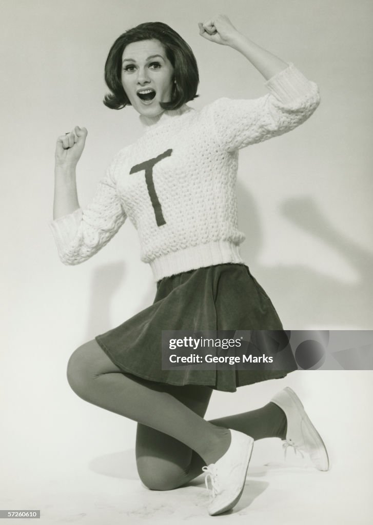 Cheerleader posing, (B&W), portrait