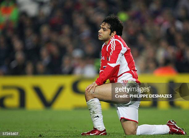 Benfica's Fabrizio Miccoli reacts after losing 2-0 to Barcelona in their Champions League quarter-final second leg football match at the Nou Camp in...