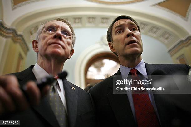 Senate Minority Leader Harry Reid and Majoriy Leader Bill Frist walk off the Senate floor and talk with the press April 6, 2006 in Washington, DC....