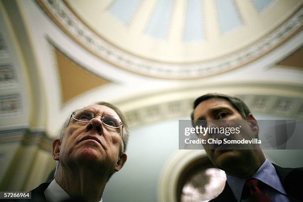 Senate Minority Leader Harry Reid and Majoriy Leader Bill Frist walk off the Senate floor and talk with the press April 6, 2006 in Washington, DC....