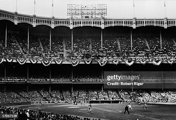 American professional baseball player Bill Skowron , first baseman of the New York Yankees, watches to see how a pitch turns out during a World...