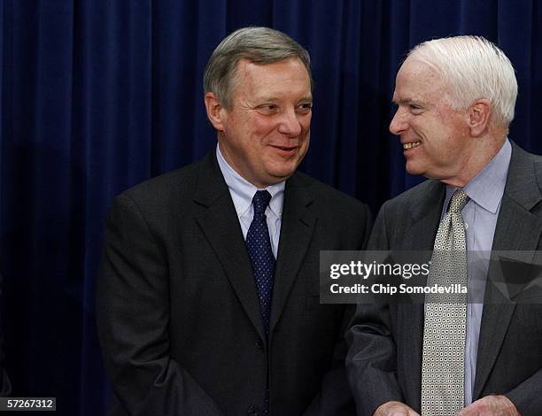 Senate Minority Whip Richard Durbin and U.S. Sen. John McCain talk during a news conference at the Capitol April 6, 2006 in Washington, DC. Senators...