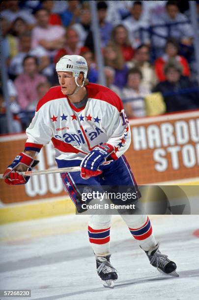 Canadian professional hockey player John Druce of the Washington Capitals skates on the ice during a home game, Capital Centre, Landover, Maryland,...