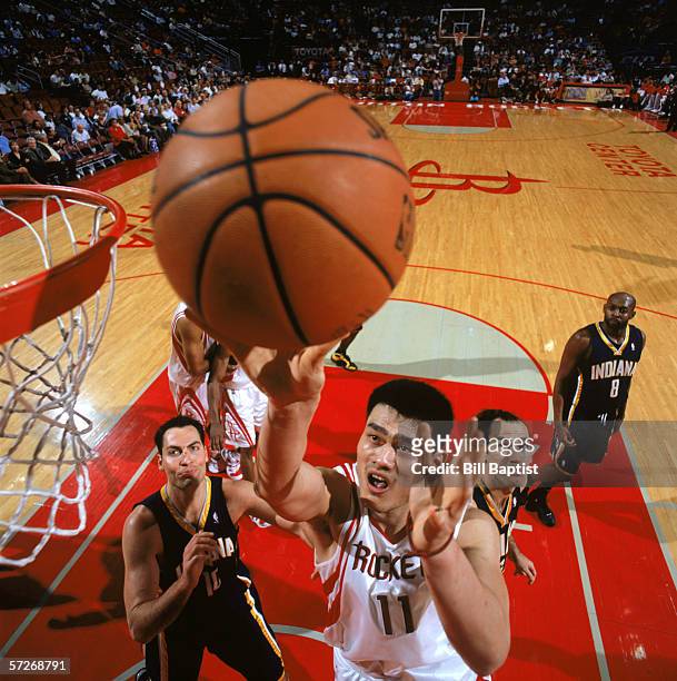 Yao Ming of the Houston Rockets goes to the basket during a game against the Indiana Pacers at Toyota Center on March 8, 2006 in Houston, Texas. The...