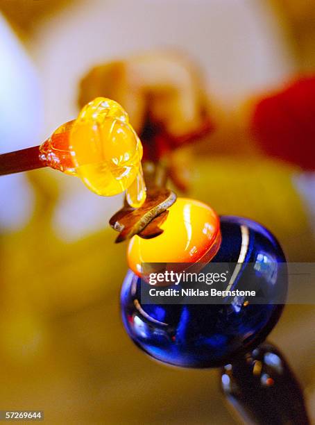 part of the process of making art glassware. - glass blowing stock pictures, royalty-free photos & images