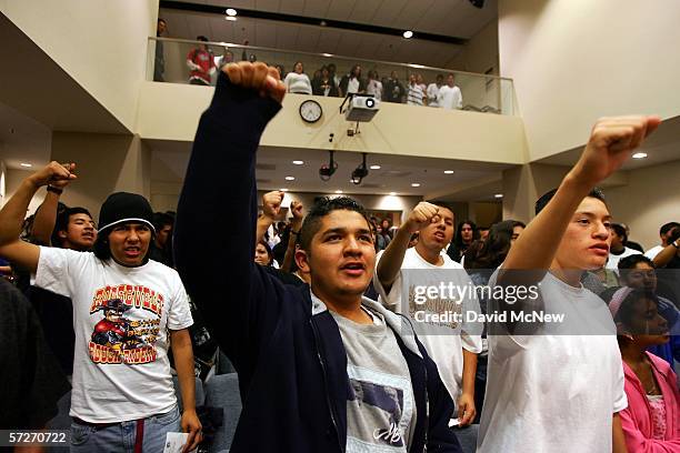 Students from the East Los Angeles community group Inner City Struggle chant and raise their fists in peaceful solidarity at a Los Angeles Unified...