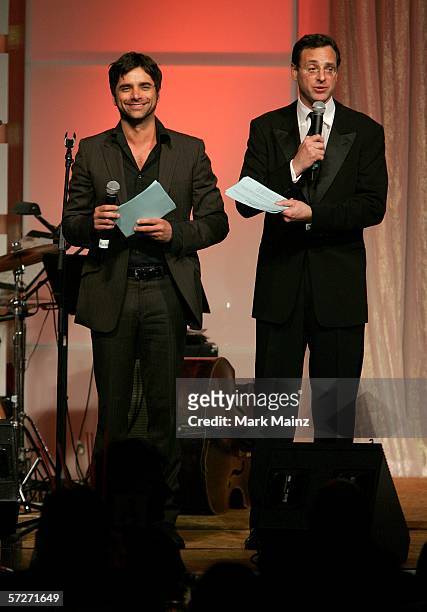 Actors John Stamos and Bob Saget hold the live auction at the 16th "Cool Comedy - Hot Cuisine" benefiting Scleroderma Research Foundation at the...