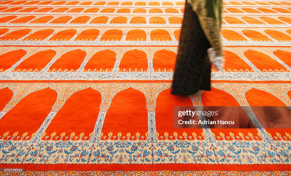 Woman silhouette in Hijab in mosque