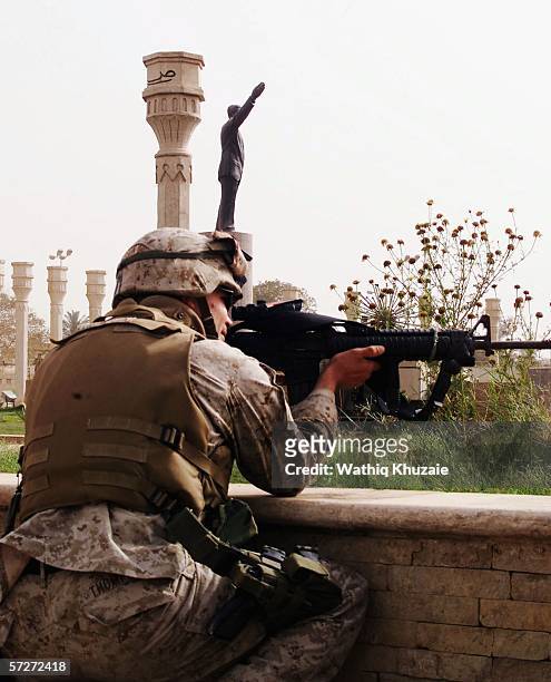 Marine is seen on April 9, 2003 near the at al-Fardous square in Baghdad, Iraq. The third year anniversary since the overthrow of Saddam Hussein will...