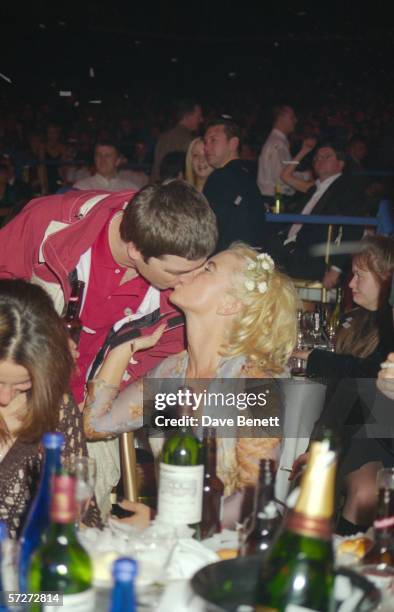 Noel Gallagher of rock group Oasis with his wife Meg Matthews at the Brit Awards, 24th February 1997.