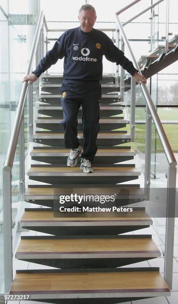 Sir Alex Ferguson of Manchester United arrives for the press conference ahead of United's match against Arsenal at Carrington Training Ground on...