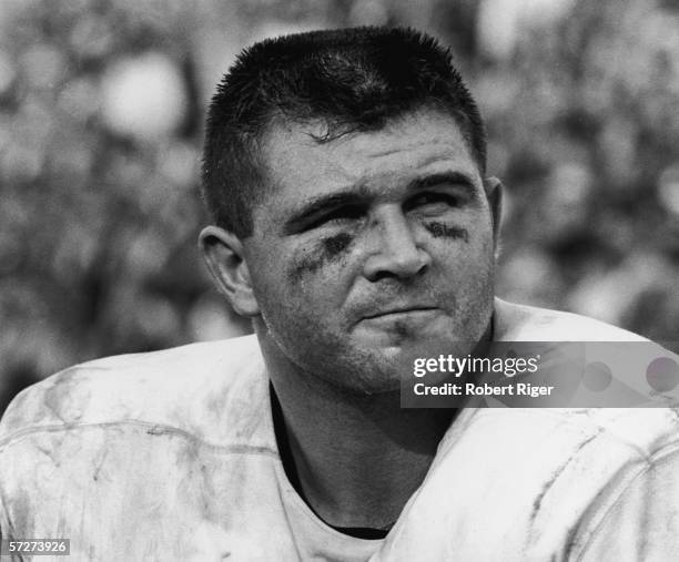 Headshot of American professional football player Mike Ditka, in uniform during a game, 1960s.