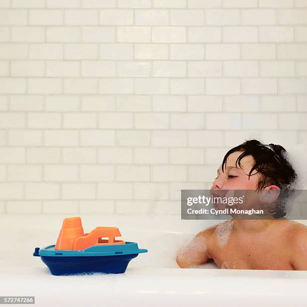 bath, boat, bubbles - boat in bath tub stock pictures, royalty-free photos & images