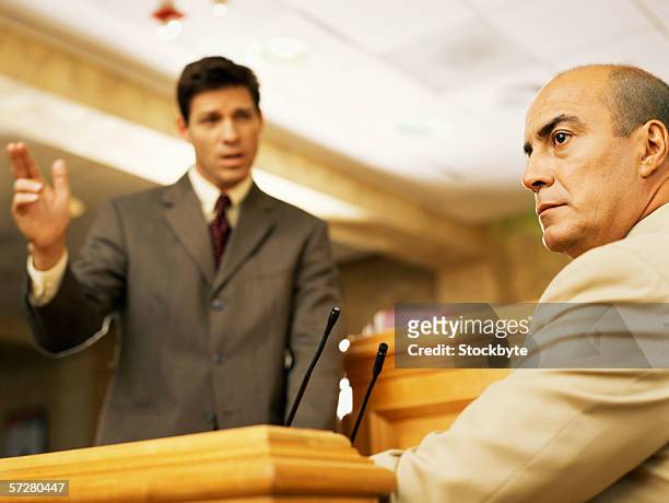 mature man on the witness stand, testifying - witness stock pictures, royalty-free photos & images