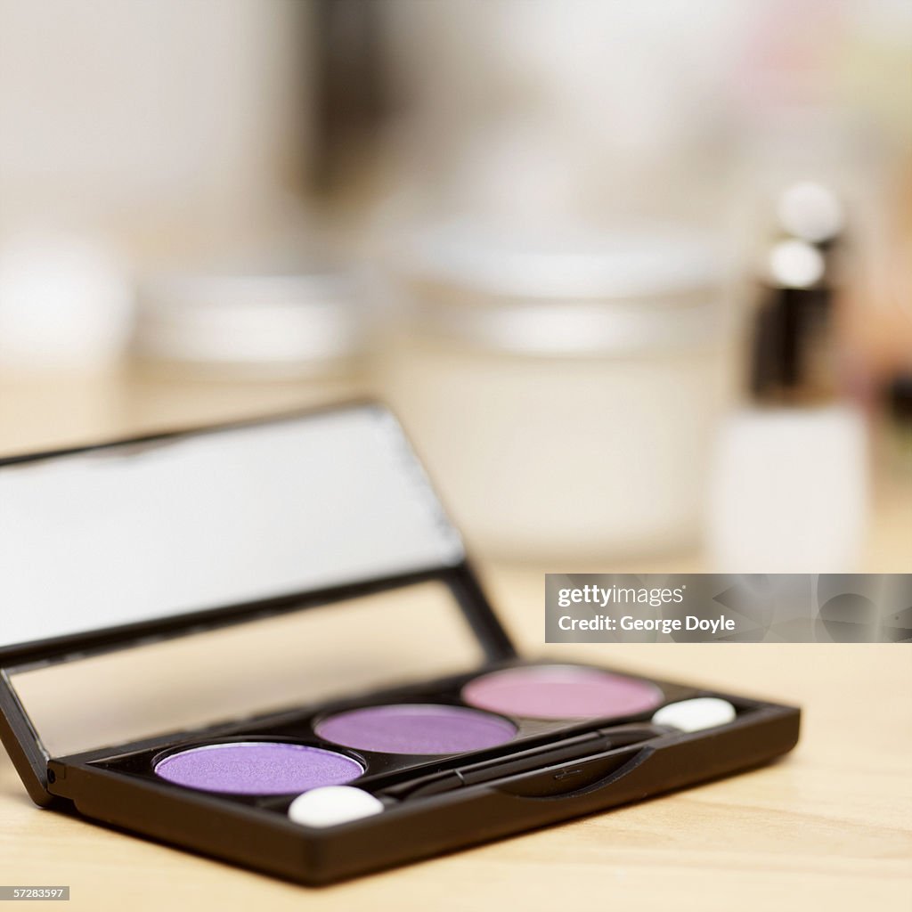 Close-up of eye shadow container