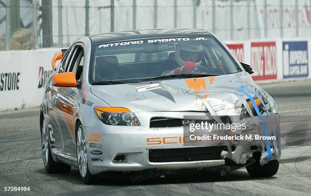 Actor Antonio Sabato Jr., is seen on the course driving his wrecked race car during practice for the Toyota Grand Prix of Long Beach Celebrity Race...