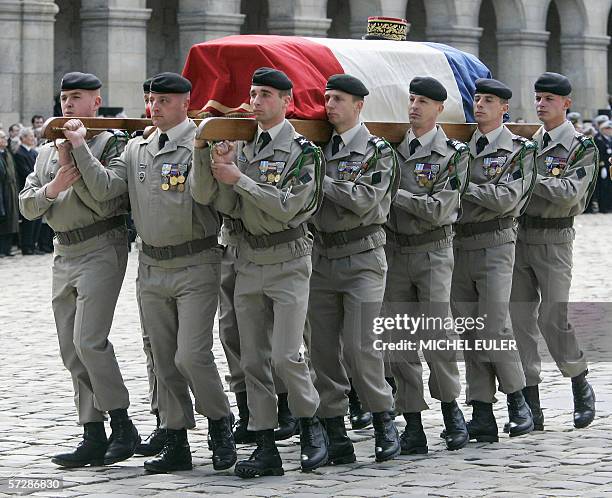 Honor guards carry the coffin of French General Alain de Boissieu, General De Gaulle's son-in-lawduring the funeral ceremony at the Invalides in...