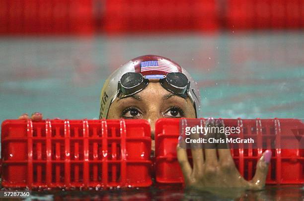 Maritza Correia of the USA checks her time on the scoreboard after the Women's 50m freestyle semi final during day four of the FINA World Swimming...