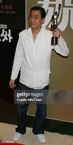 Hong Kong actor Tony Leung Ka Fai wins Best Actor award for his movie "Election" at the 25th Hong Kong Film Awards on April 8, 2006 in Hong Kong,...