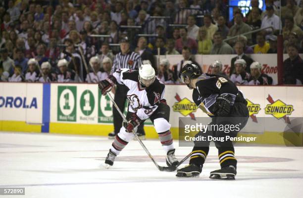 Curtis Brown of the Buffalo Sabres tries to get past Jaromir Jagr of the Pittsburgh Penguins during game 7 of the Eastern Conference Semi Finals of...