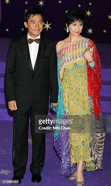 Hong Kong actor Tony Leung and actress Carina Lau arrive at the 25th Hong Kong Film Award on April 8, 2006 in Hong Kong, China.