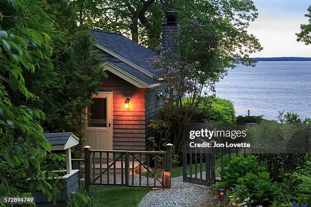cottage at sunrise - cottage water stock pictures, royalty-free photos & images